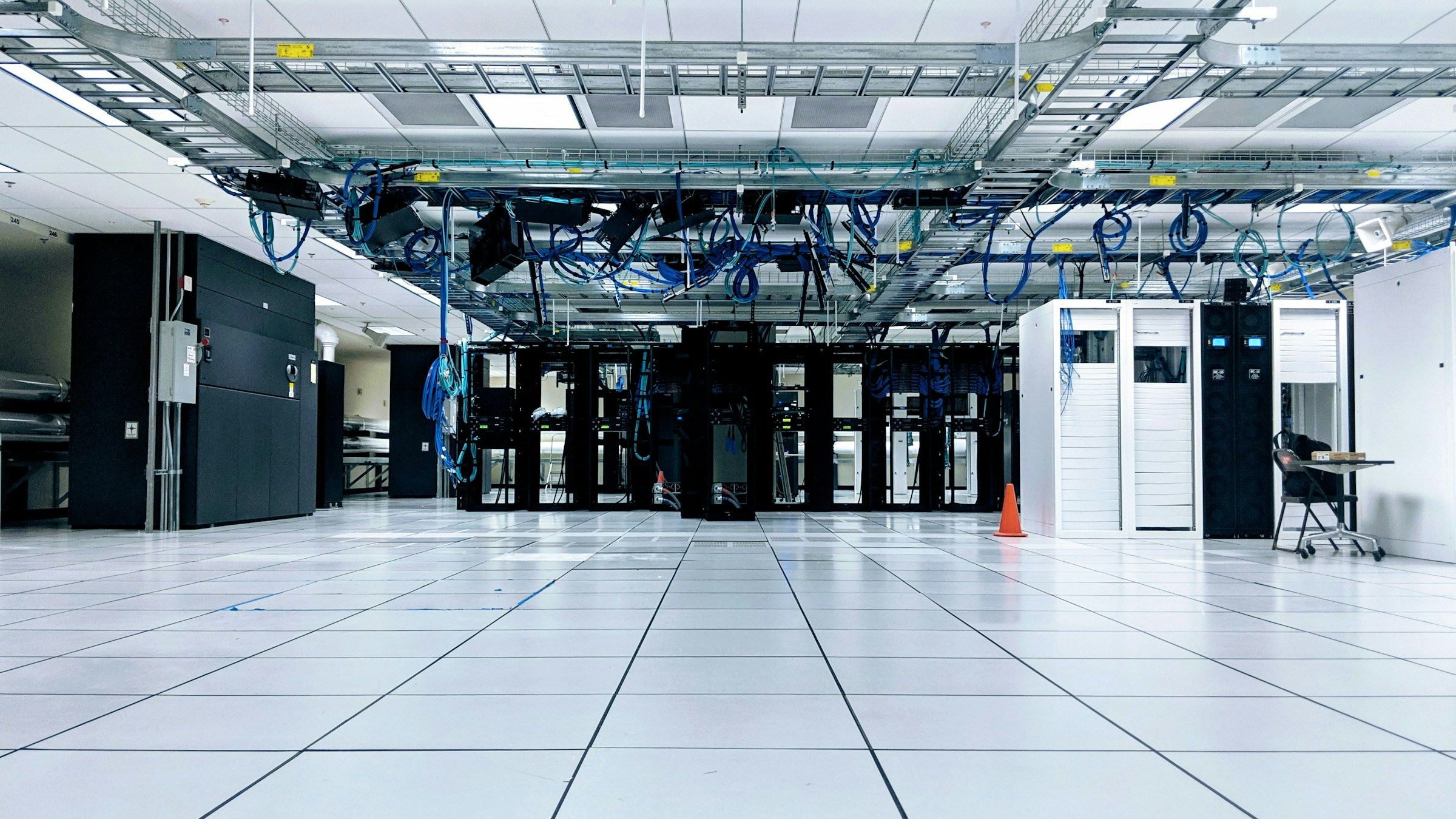 Rows of server cabinets on a data center floor